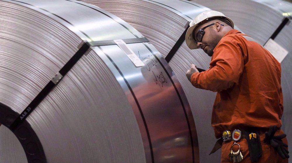 Trump lifts tariffs on Canadian aluminum, warns he may resume them