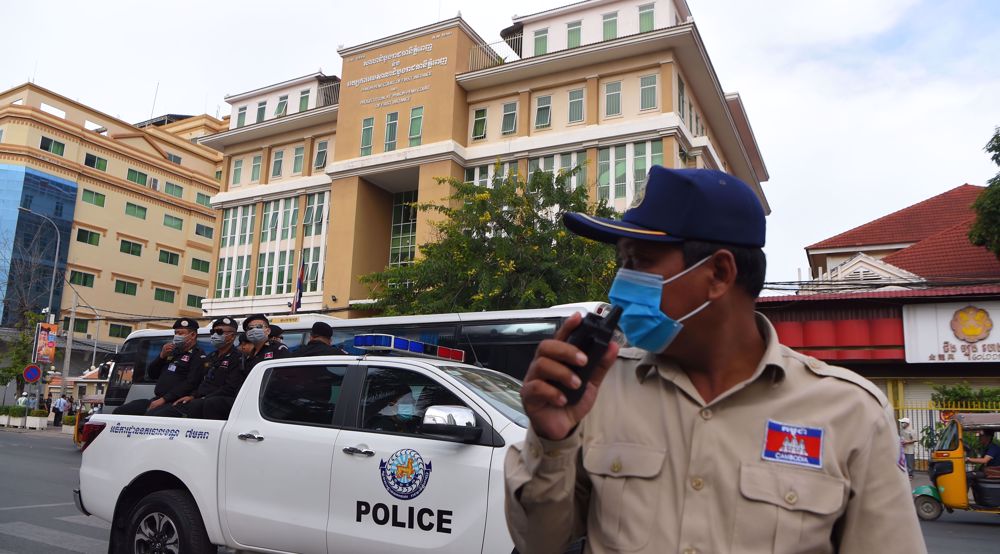 Cambodia holding mass trial for opposition members