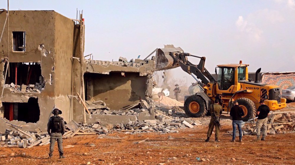 Israeli forces raze Palestinian house, bulldoze more land in West Bank