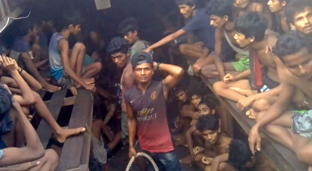 Video shows smugglers beating Rohingya refugees on Malaysia-bound boat