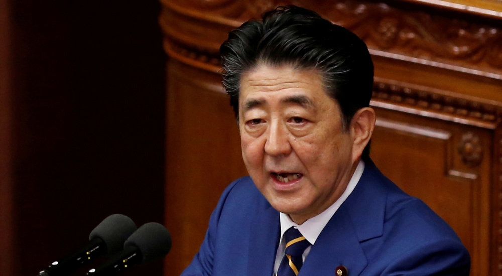Japan prosecutors seek to query former PM Abe in political funding case: Media