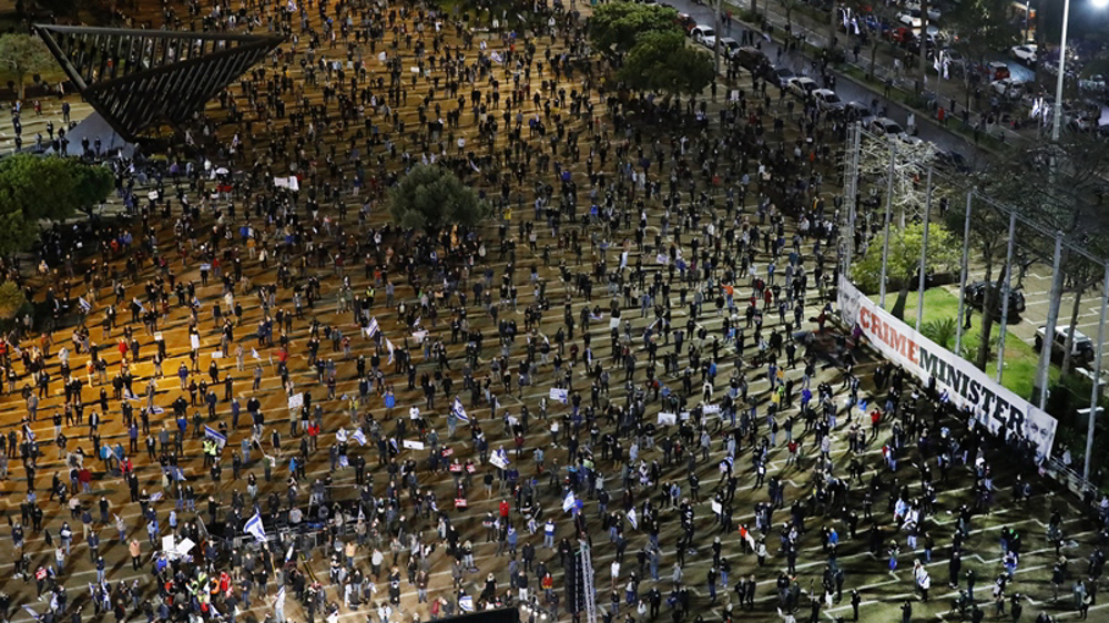 Israelis protest Netanyahu's coalition deal amid corruption probe