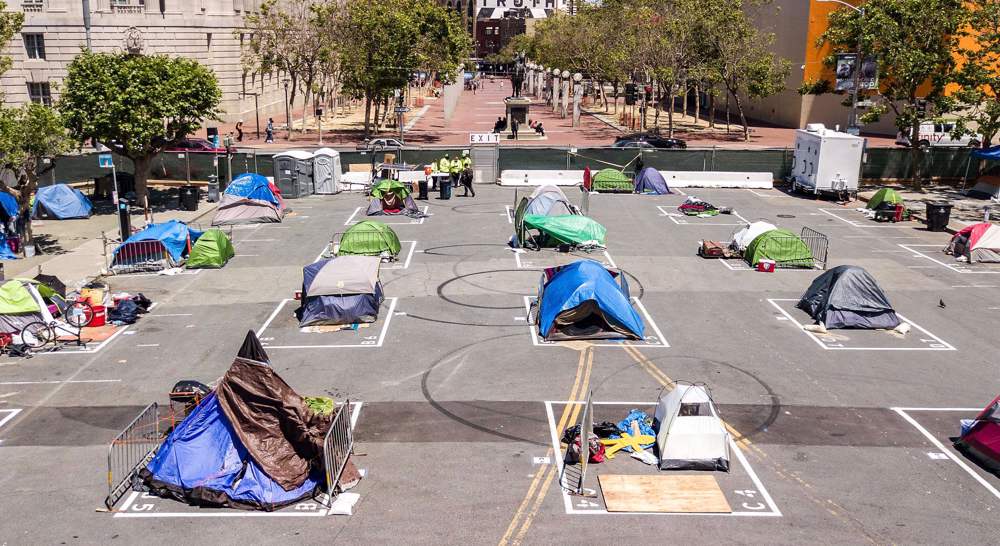 US cities authorize homeless tents as virus crisis spreads 