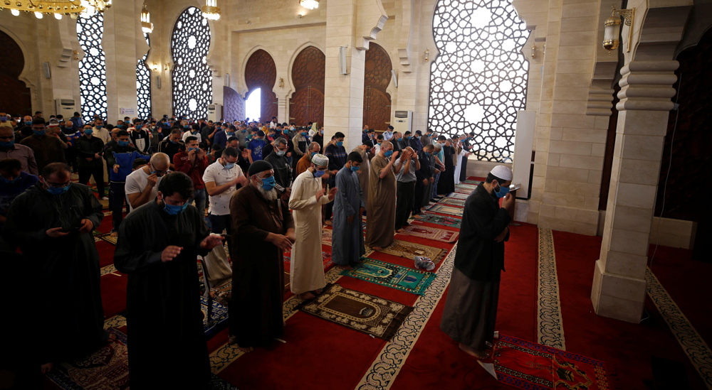Palestinians hold Eid al-Fitr prayers amid coronavirus restrictions