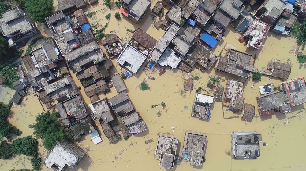 Floods in southern China kill dozens, displace hundreds of thousands