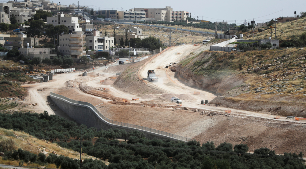 Israeli settlers start building road to connect West Bank settlements
