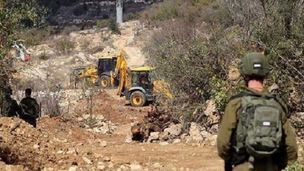 Israel begins building road isolating Palestinian town in West Bank
