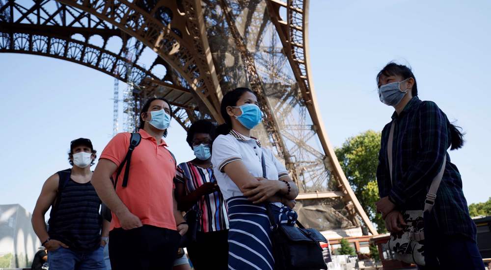 Eiffel Tower reopens to visitors after months-long coronavirus closure 