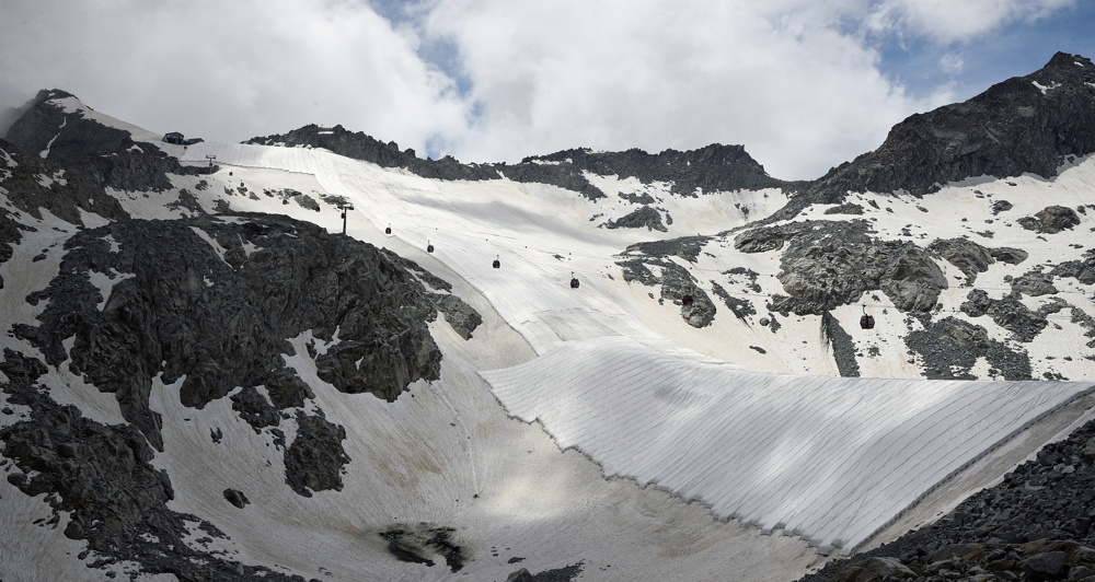 Glacier in Italy wrapped with huge sheets to prevent melting