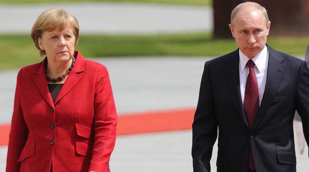 Putin, Merkel say 'no point' in sanctions pressure against Iran