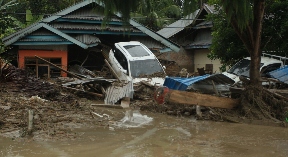 At least 21 dead as flash floods leave trail of destruction in Indonesia