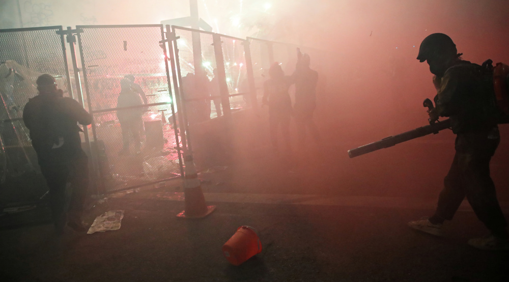 Protests hit Portland for 56th day; Trump plans 'surge' of agents