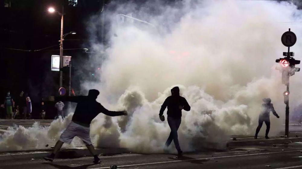 Violent clashes erupt as Serbians protest new COVID-19 lockdown
