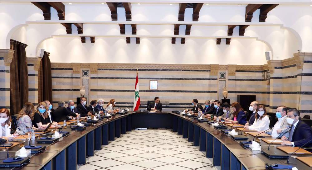 Lebanon ministers: Cabinet will stay to resolve crisis
