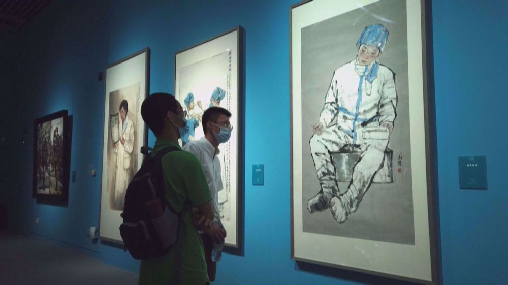 Art exhibition showcases China's fight against COVID-19