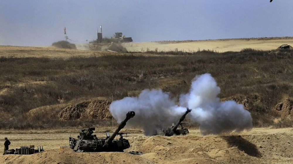 Israeli tanks shell Palestinians' sites in central Gaza Strip