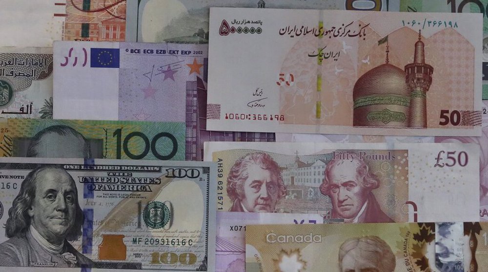 Iran currency rial firms against dollar by nearly 10%