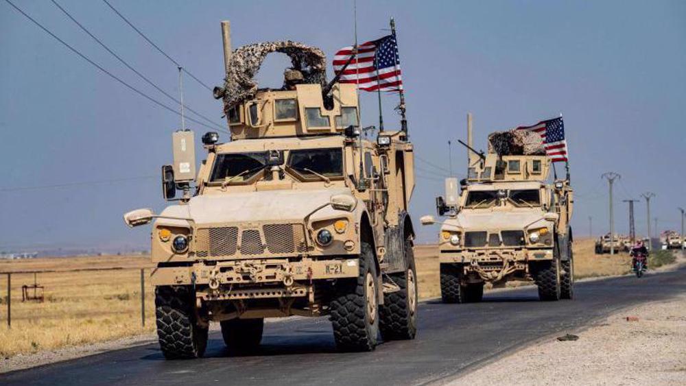 Two more US convoys targeted by roadside bombs in Iraq