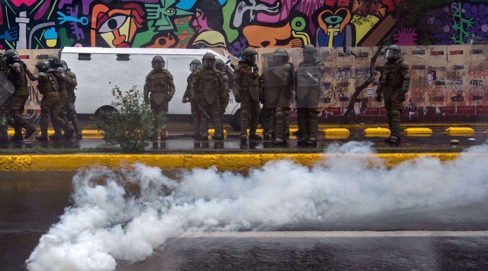 One dead, 17 hurt in Chile as police clash with indigenous protesters