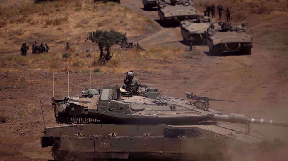 Israel moves tanks to occupied Golan after Syria vows to reclaim it