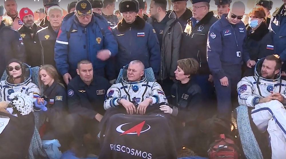 Russian crew return to Earth after filming first movie in space