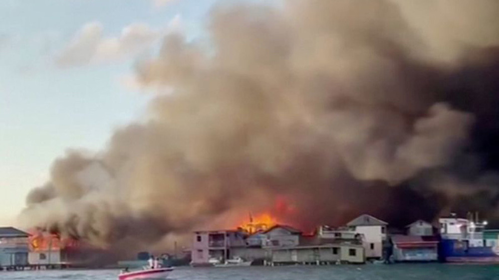 Hundreds flee as fire devastates resort island of Guanaja in Honduras