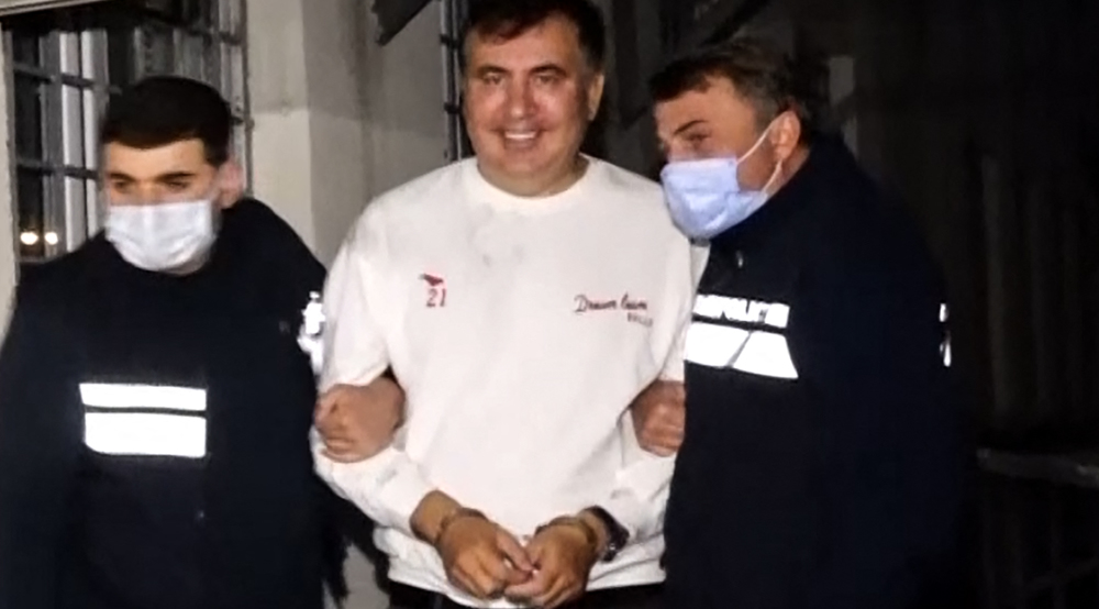 Georgia ruling party leads vote overshadowed by Saakashvili's arrest