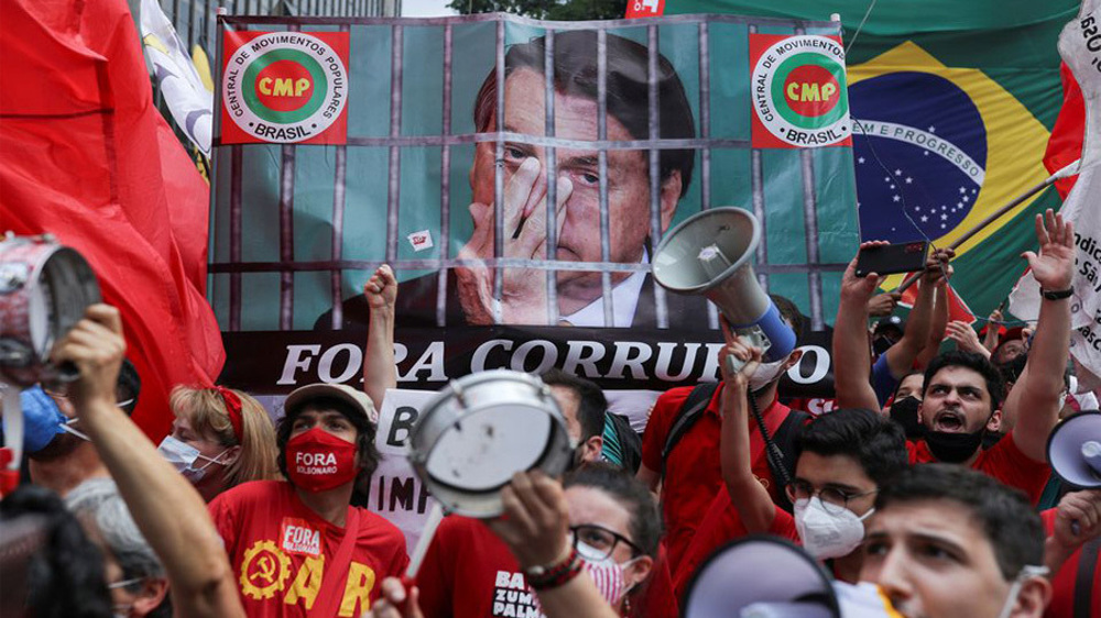 'Out with Bolsonaro': Brazilians rally against president 