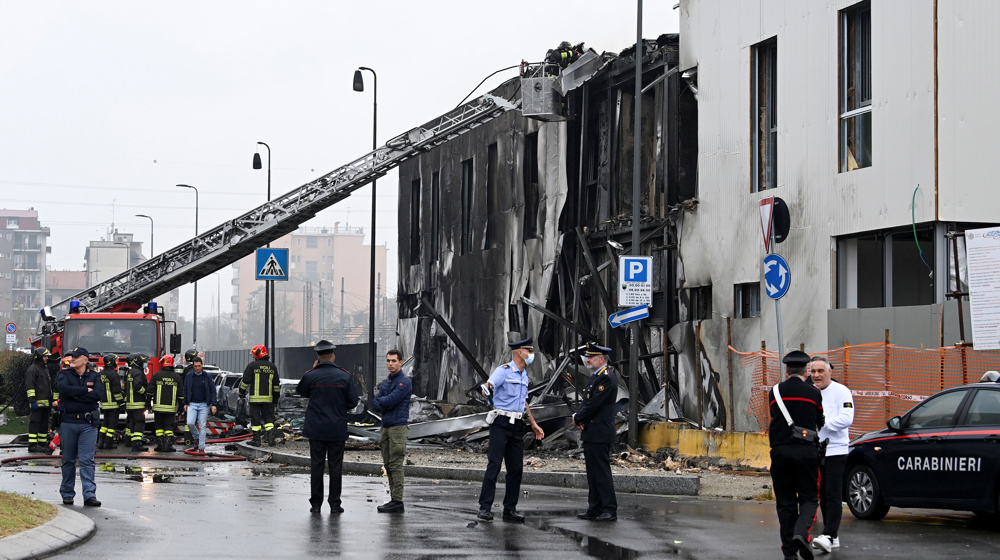 Eight killed as plane crashes into building near Milan