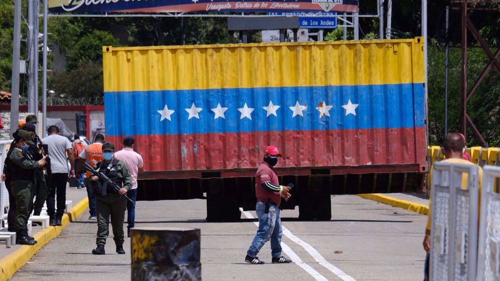 Venezuela opens border with Colombia after more than two years