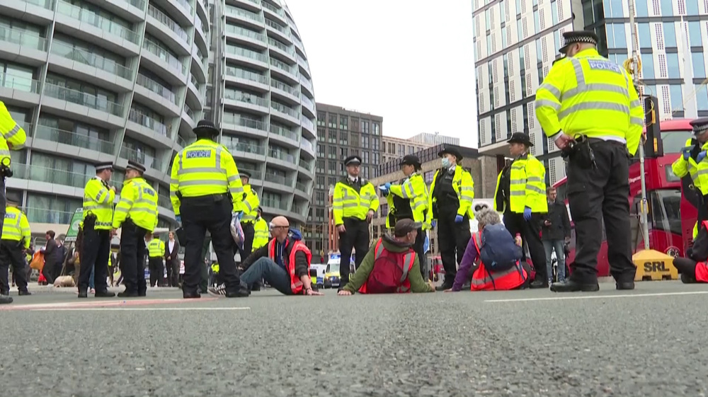 Climate activists block busy London roundabout
