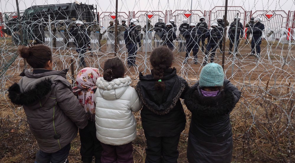Poland detains 100 migrants at border, says Belarus helped intruders