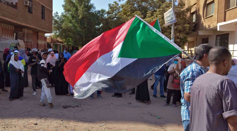 As death toll mounts, Sudanese anti-coup activists call for mass protest 