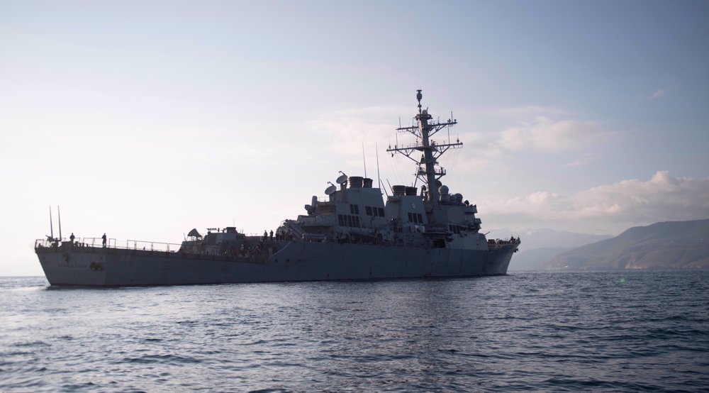 Russia says monitoring US  destroyer, warns of 'small war' 
