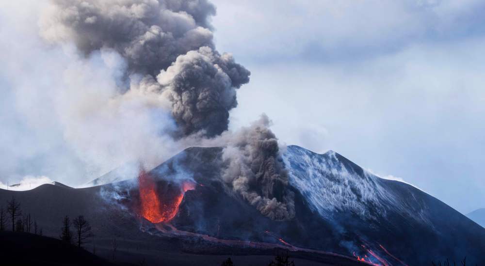 Lava bursts through a new opening in La Palma volcano