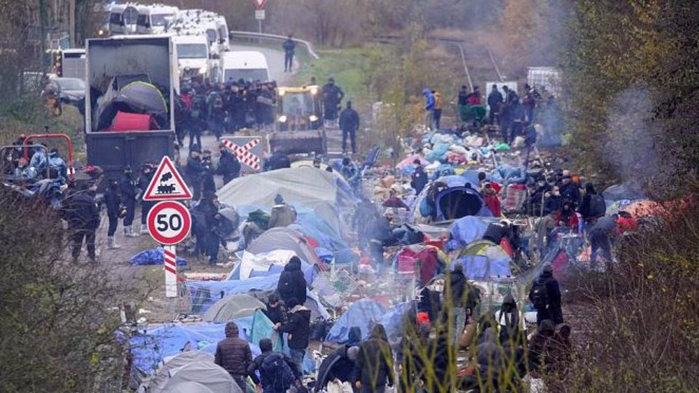 French police tear down refugee camp near port of Dunkirk