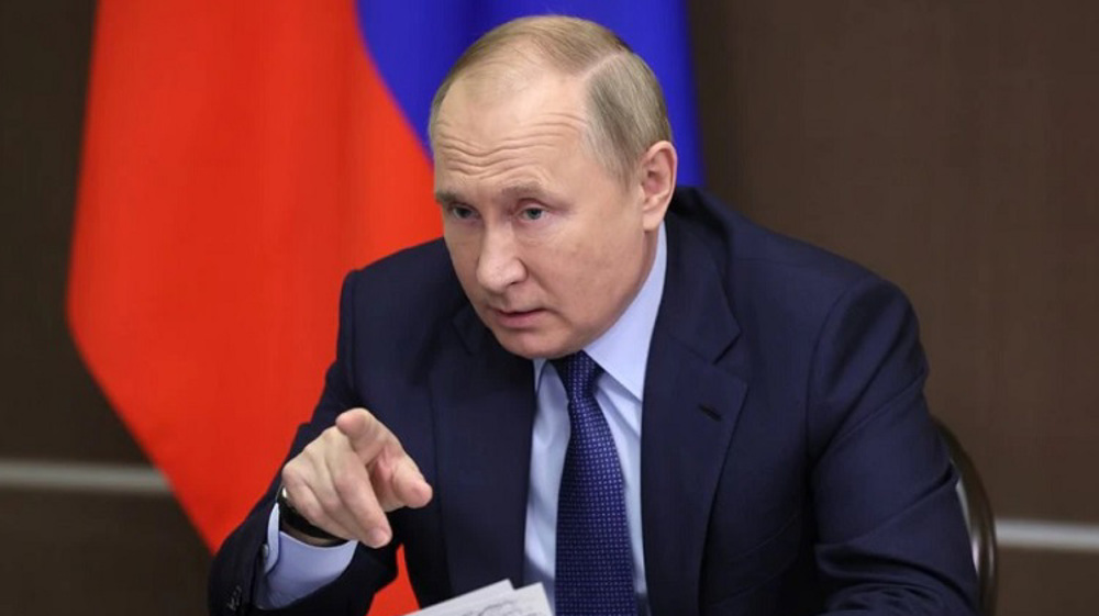 Putin says war on ethnic Russians in Ukraine’s east ‘certainly looks like genocide’