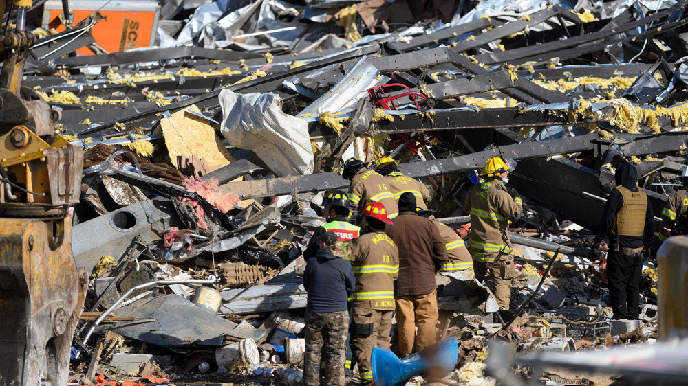"Hell on earth": Kentucky tornado survivors sift through debris