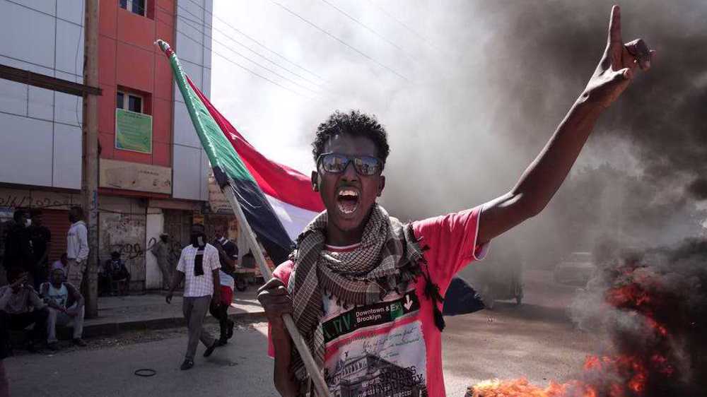 In Khartoum, Sudanese anti-coup protesters are met with tear gas