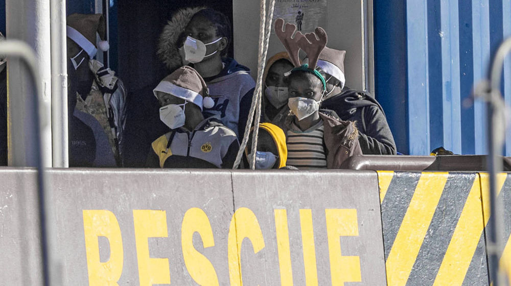Italy lets 500+ refugees disembark from rescue ship after two weeks