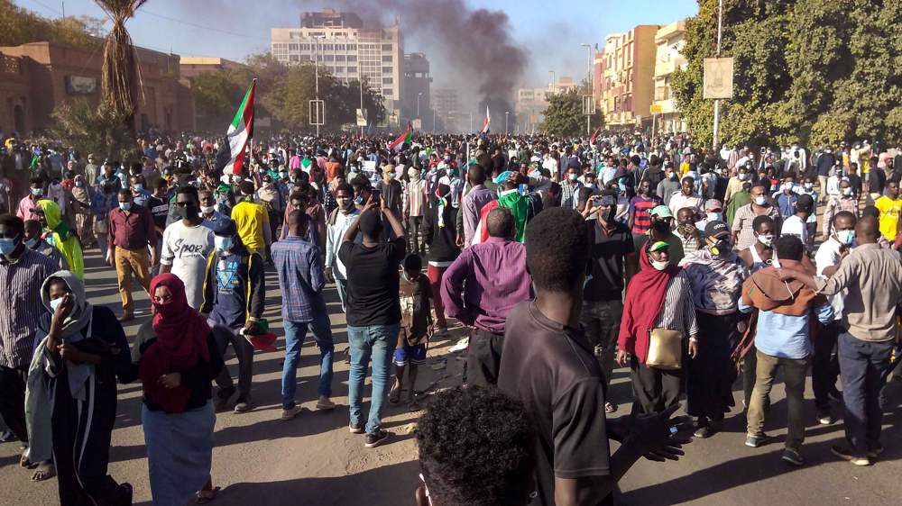 At least 4 people killed as Sudan security forces clash with thousands of anti-coup protesters