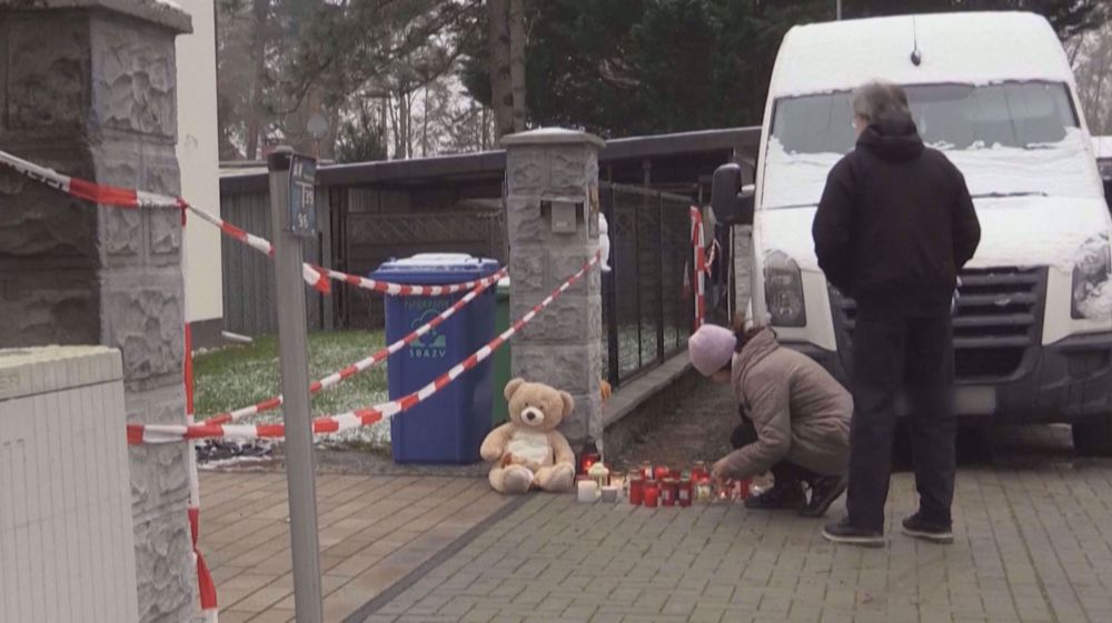 Respects paid to family found dead in a house near Berlin