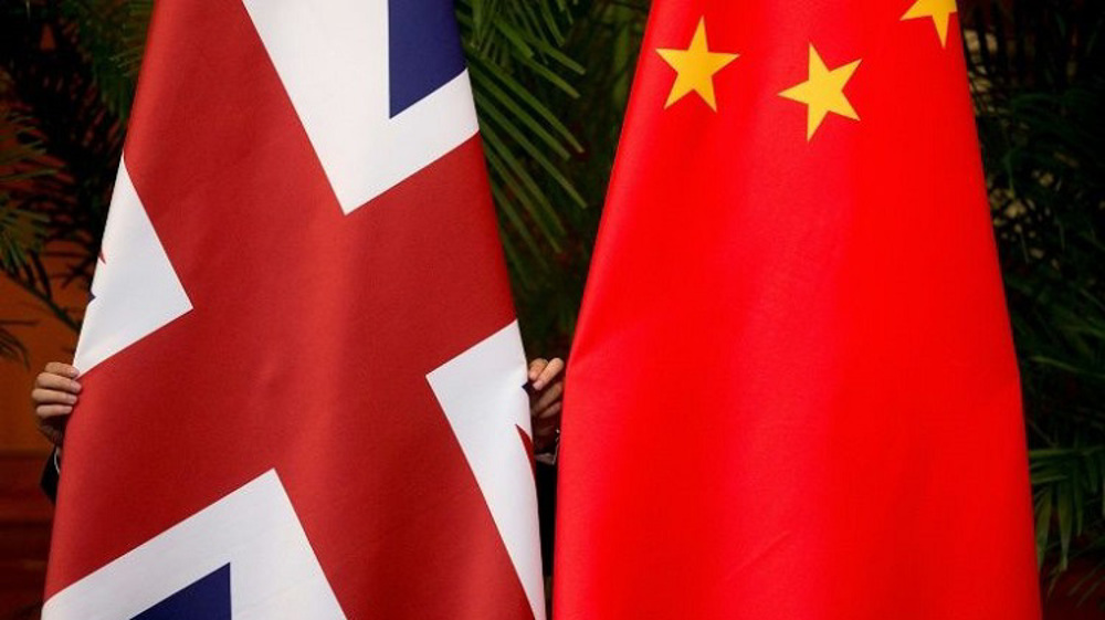 UK steps up action against China as three alleged ‘spies’ are expelled