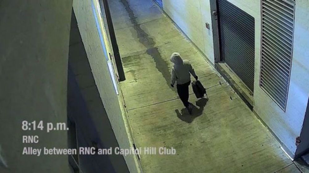 Watch man planting pipe bomb outside DNC, RNC offices