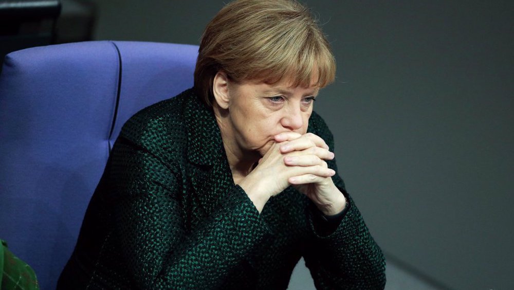 German lawmakers grilling Merkel, ministers in fraud scandal