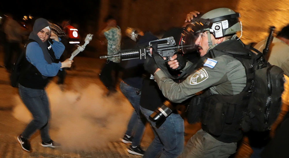 Clashes rage on in al-Quds following Israeli provocation