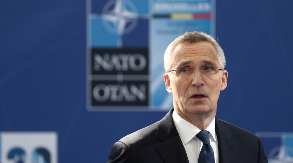 NATO chief warns of China challenge, but denies new 'Cold War' 