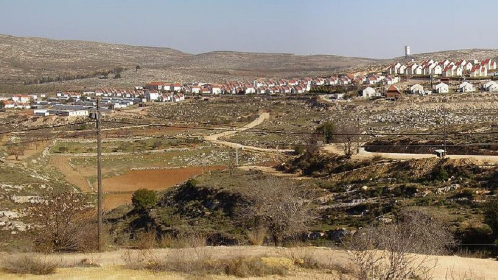 Israeli settlers build mobile homes on Palestinian land to expand illegal settlement