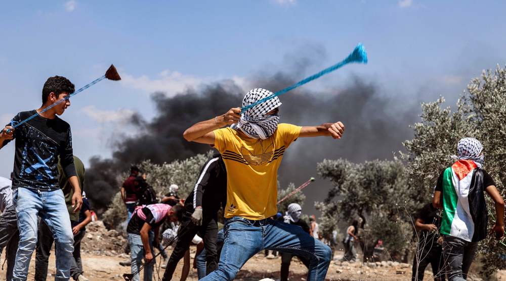Israeli settlers violently continue Palestinian land grab in West Bank