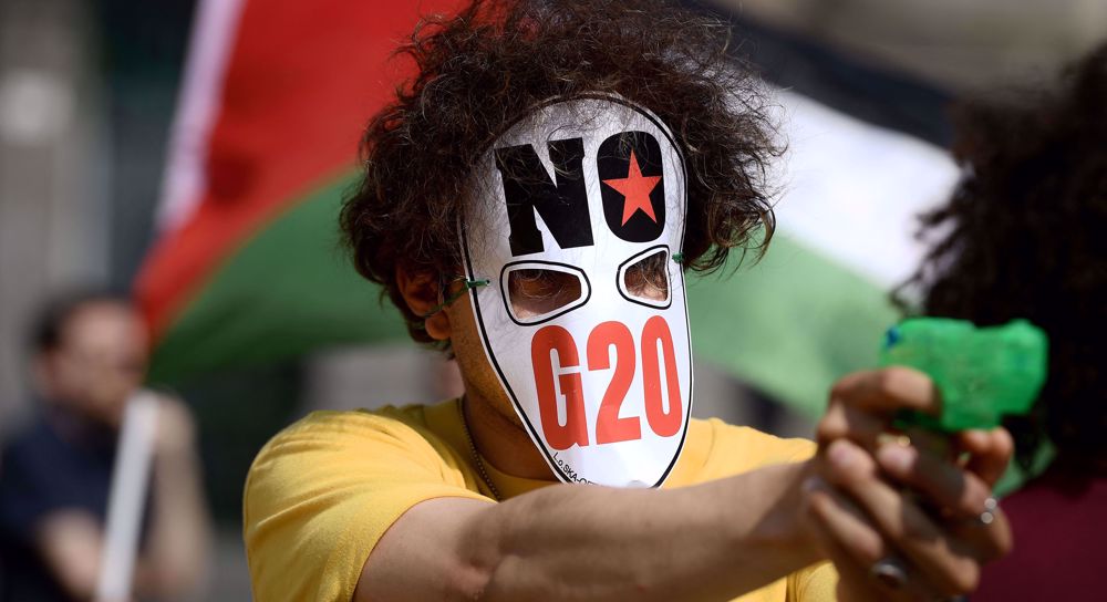G20 struggling to make progress on climate crisis amid protests in Naples